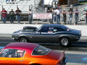 SILVER AND BLACK CAMARO DRAG CAR